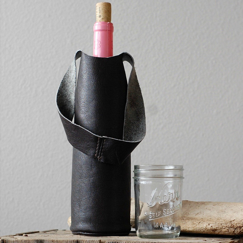 Black leather wine skin / wine bottle carrier handmade in the USA by Vicki Jean.